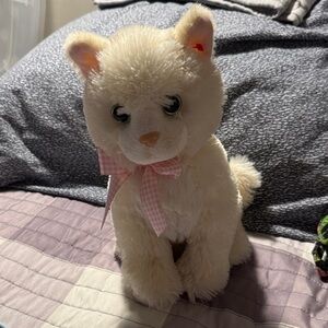 Adorable Cream Plush Cat with Pink Bow